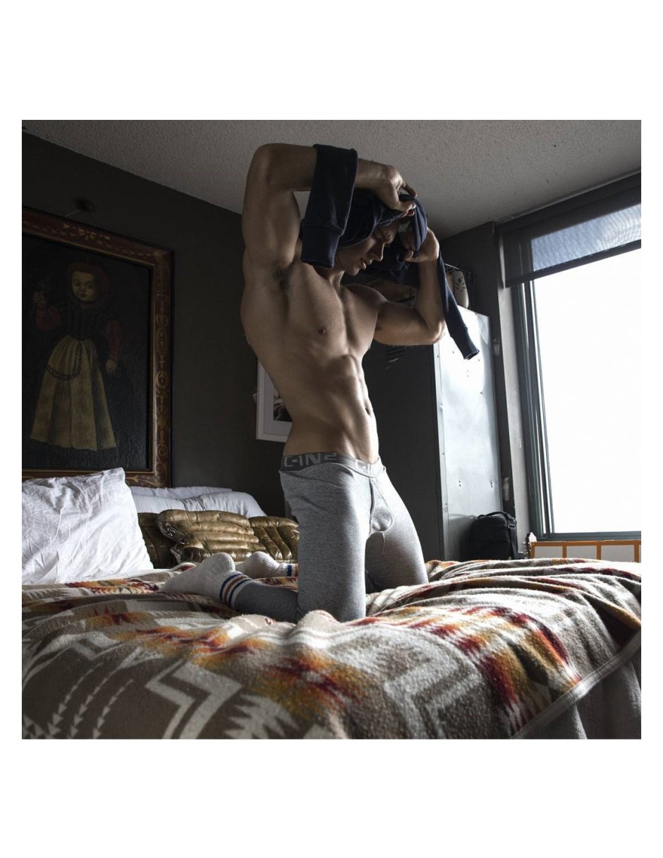 Male back on the bed