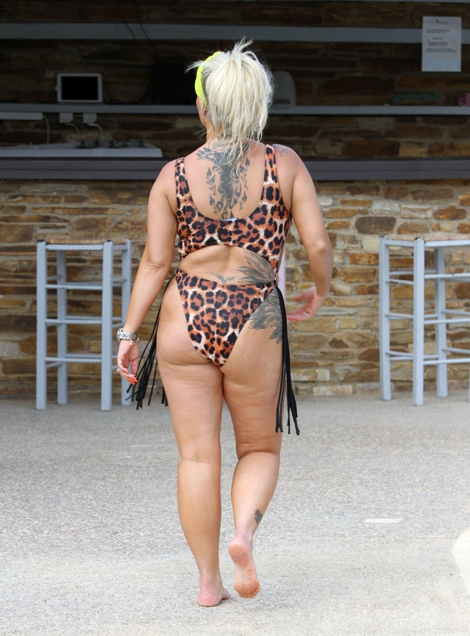 Kerry Cato on the beach naked