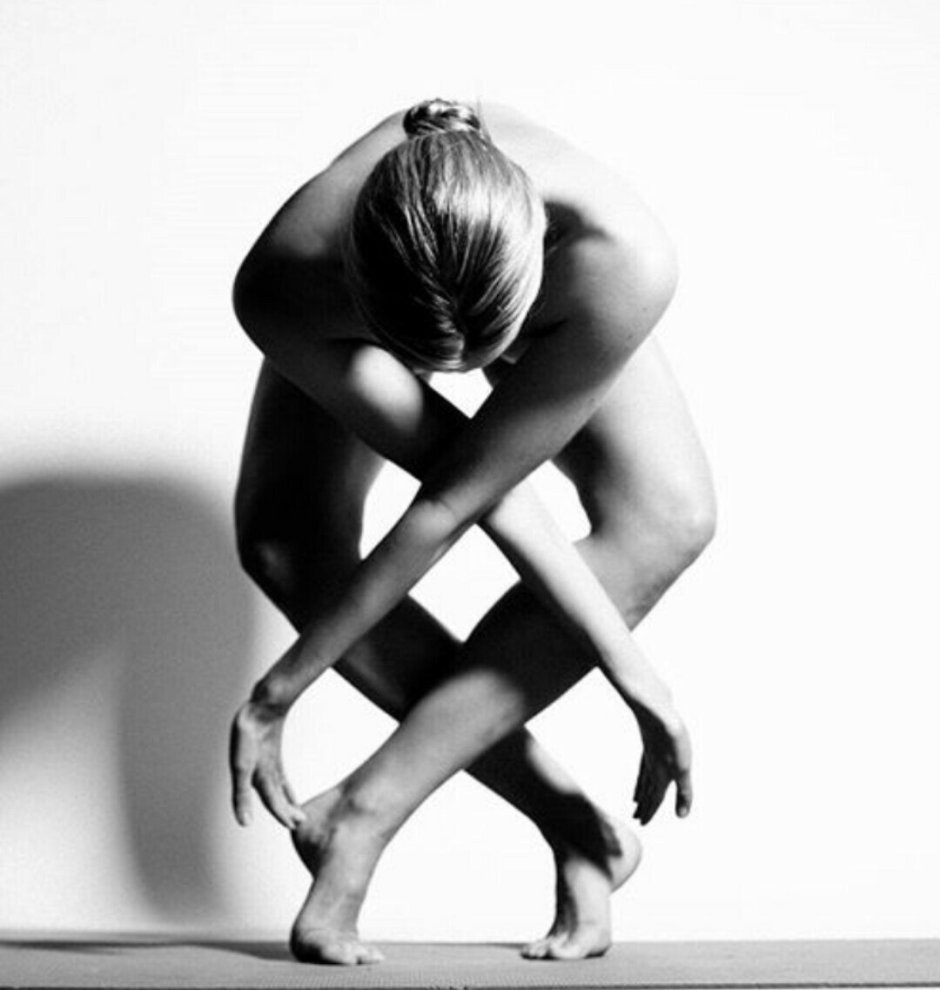 Naked yoga man and woman