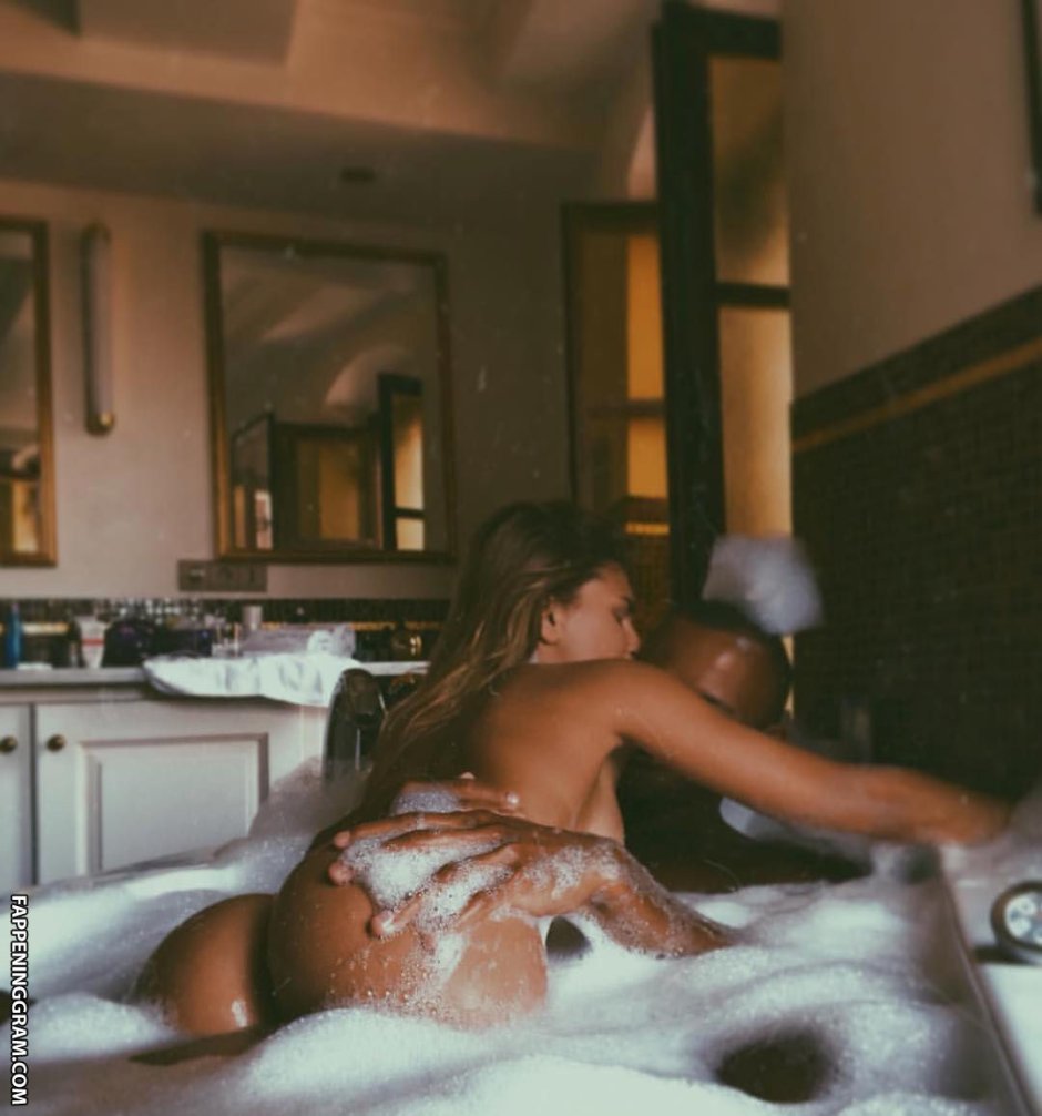 Topless girls on the bed