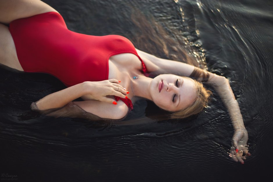 Girl in a swimsuit in water