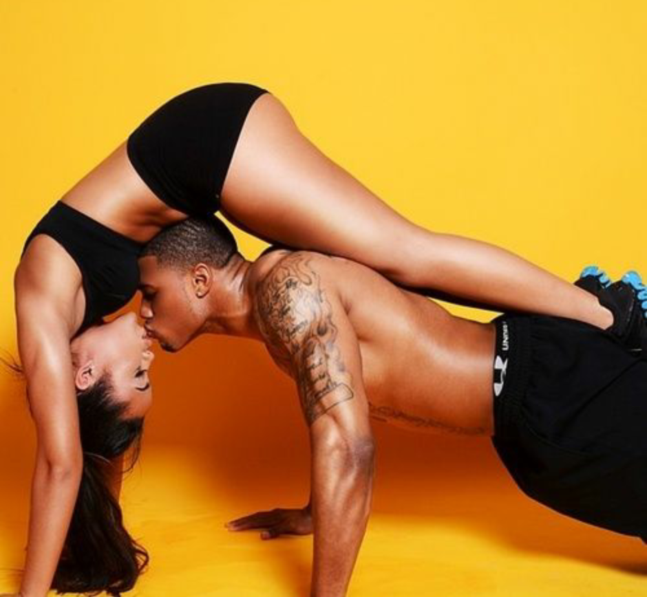 The girl bends in the lower back