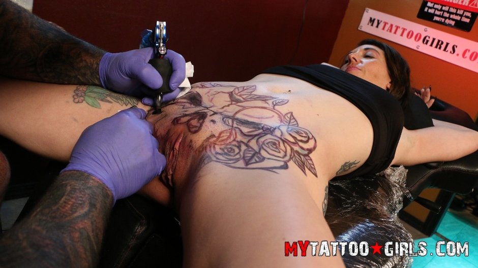 Vagina tattoo on the arm