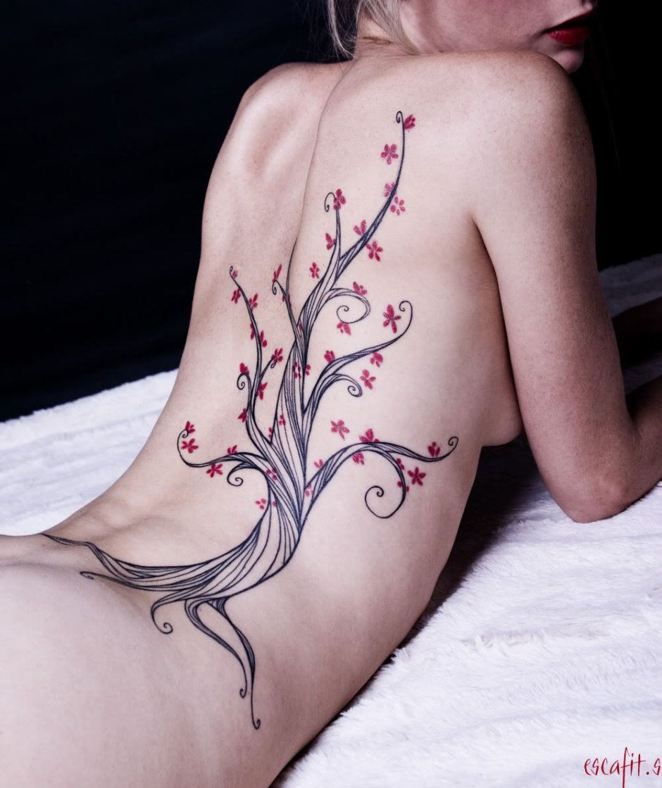 Sakura branch on the lower back tattoo