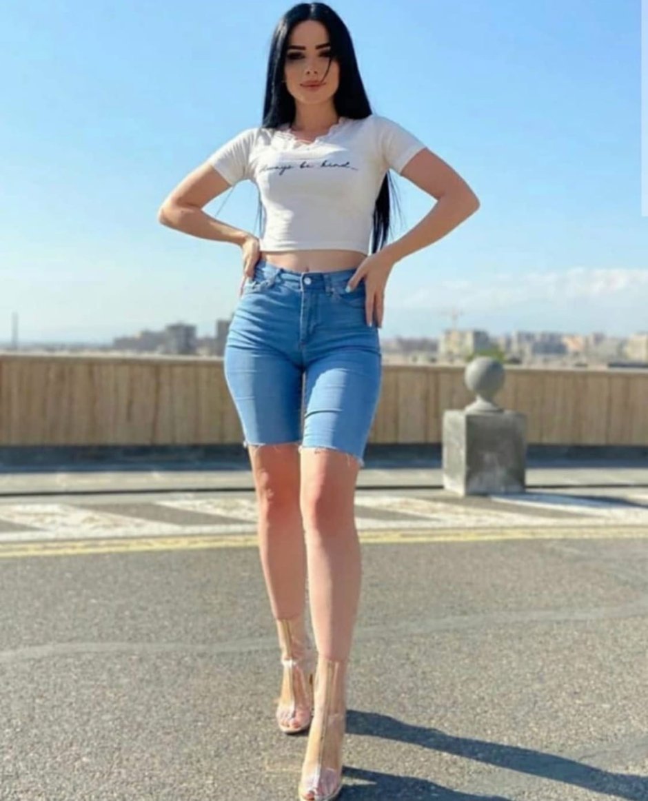 Kendra Last in a dress