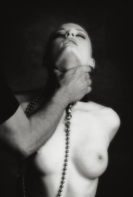 Girl slave with a collar