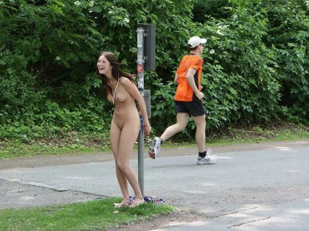 Naked women in the street front of guys