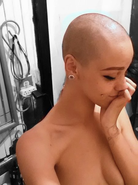 Bald porn model Riley Nixon