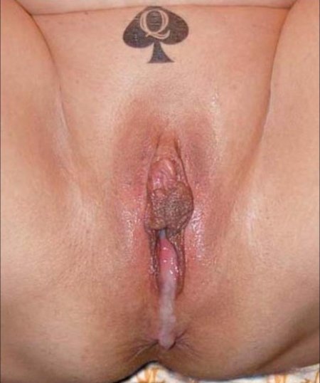 Queen of Spades tattoo on the pubic area