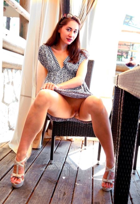 Woman in a dress without panties