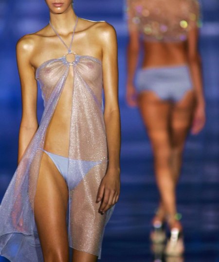 Naked fashion model on the catwalk