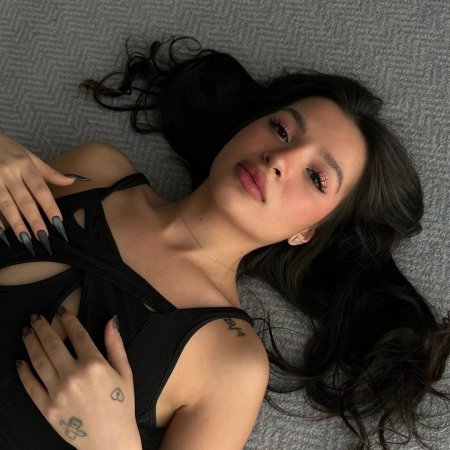 Tenderlybaemusic in a swimsuit