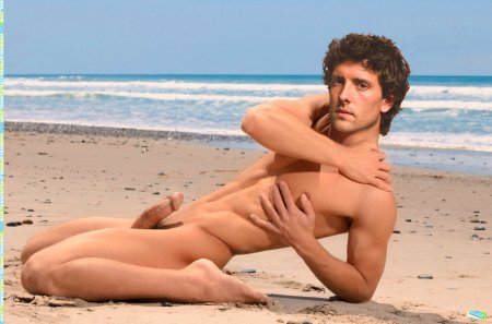 Naked boy on the beach