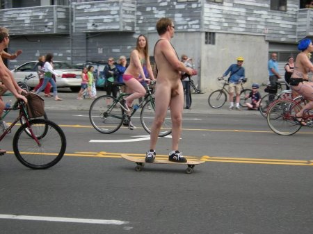 Naked guys on a skateboard