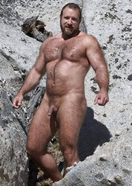 Hairy naked guy in the forest