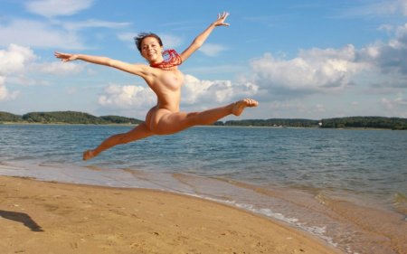 Girls jumping topless