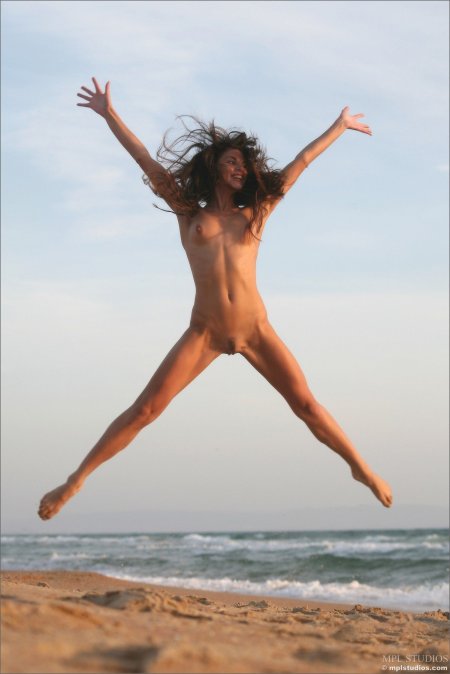 Naked girls dancing on the beach