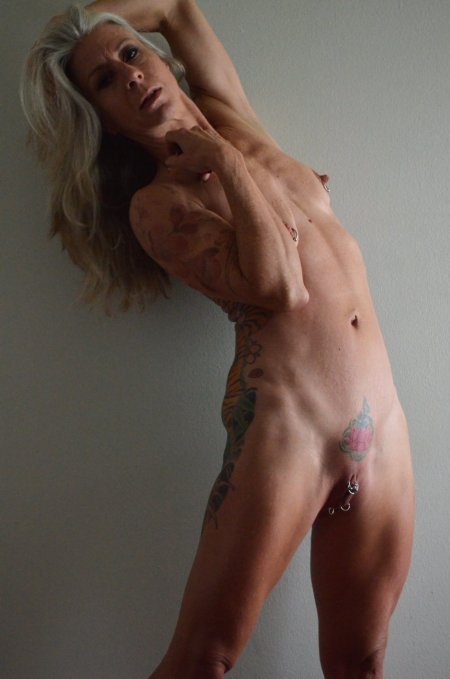 Skinny naked women with piercings