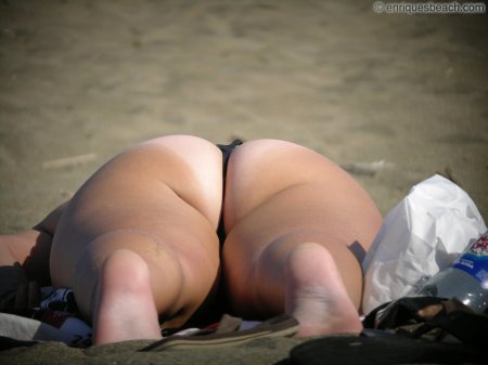 Naked Female Asses on the Beach
