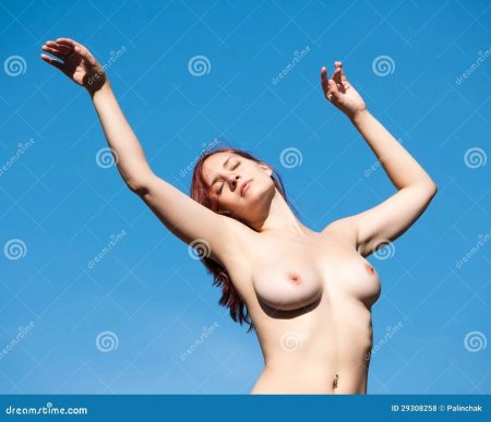Naked beauties with raised arms