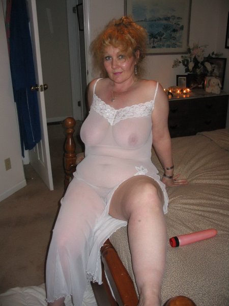 Mature granny in an erotic outfit