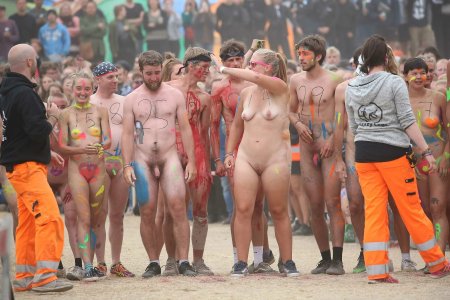Parade of naked people on the street