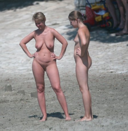 Naked nudist mothers on the beach