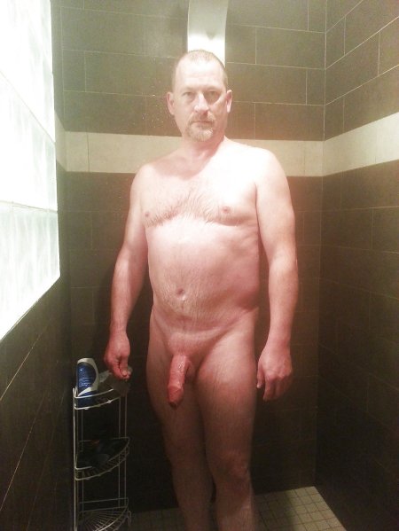 Naked adult men in a bathhouse