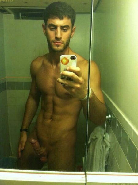 Naked Russian guys in front of the mirror