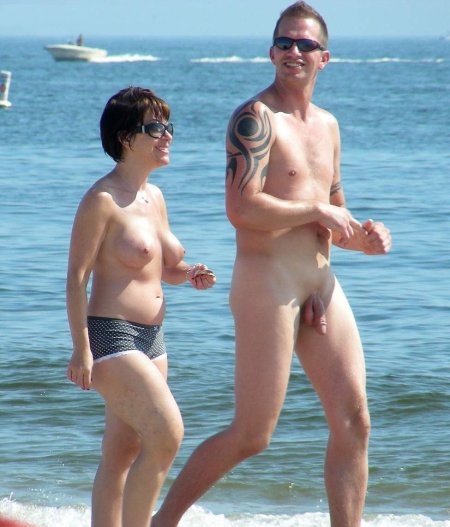 Naked guys on a nudist beach