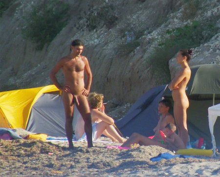 Naked men on a public beach