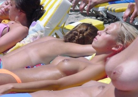 Girls relaxing topless