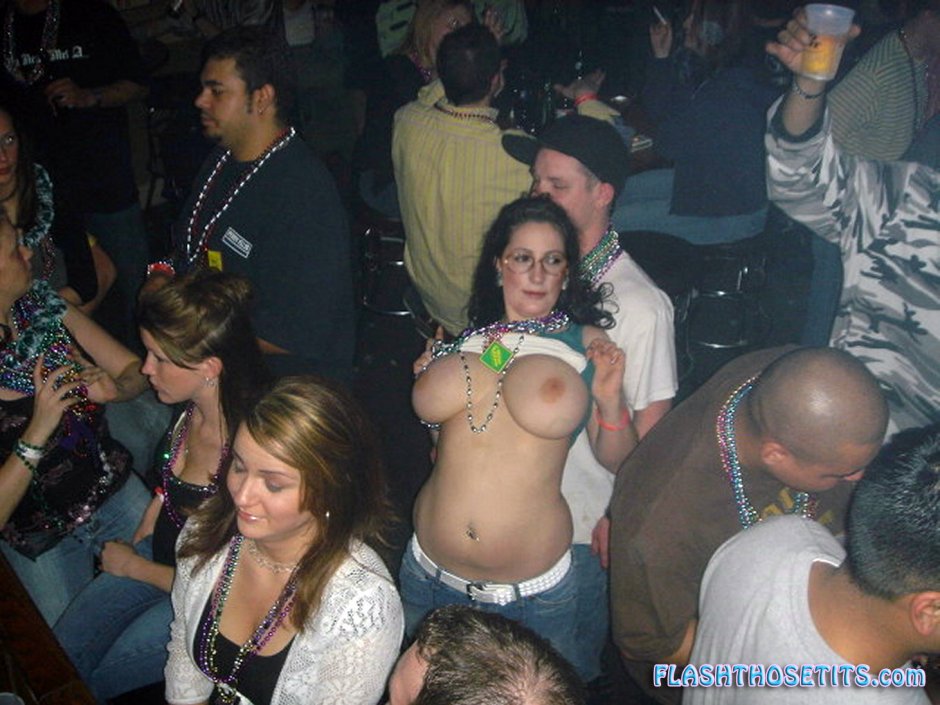 Expose breasts at the festival