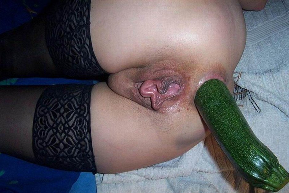 Huge cucumber in the pussy