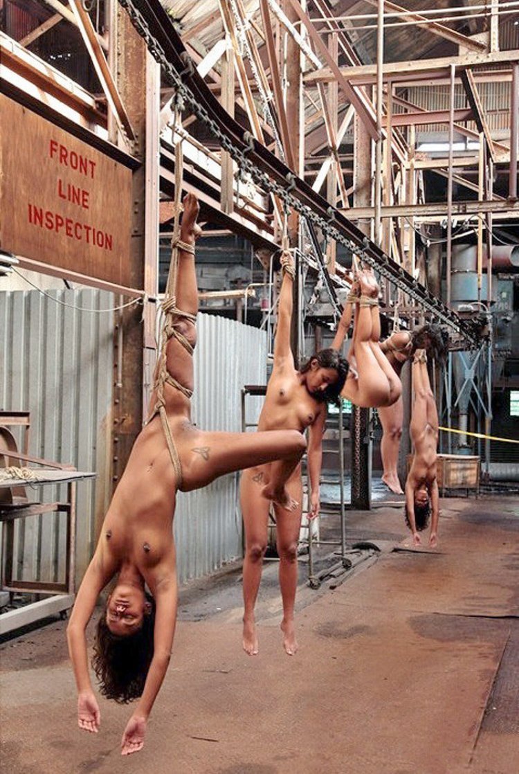 Naked hung by the legs
