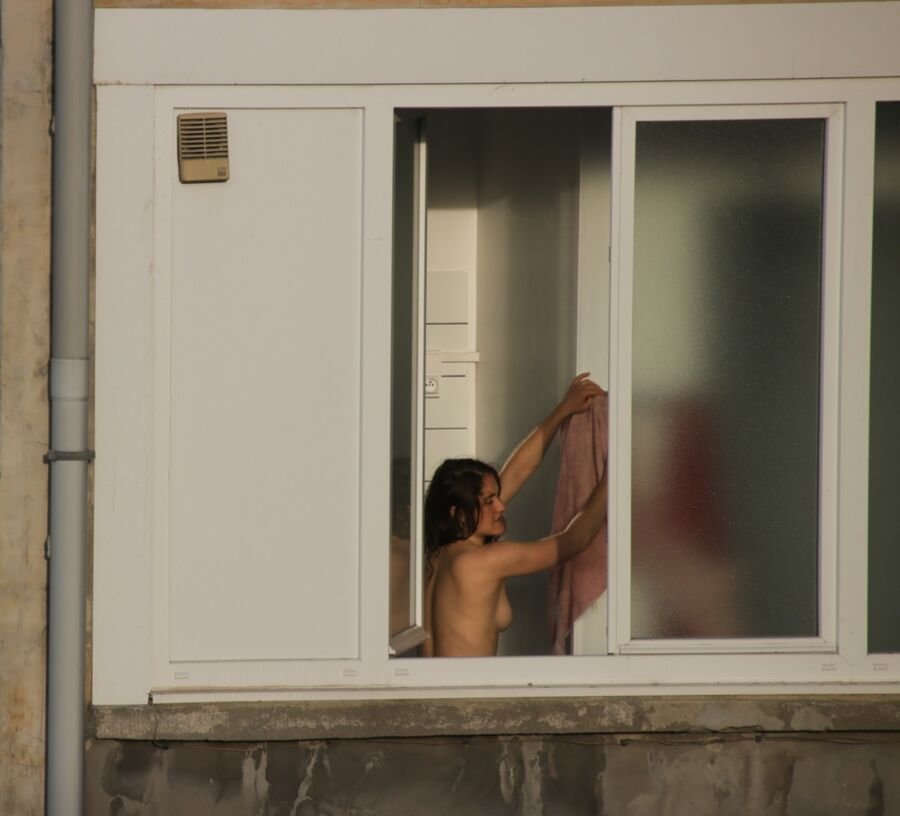 Wife sunbathes on the balcony nude