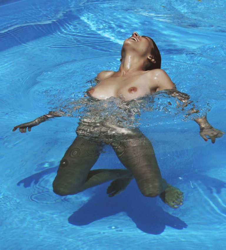 Naked Underwater Girl Drows and Swimming
