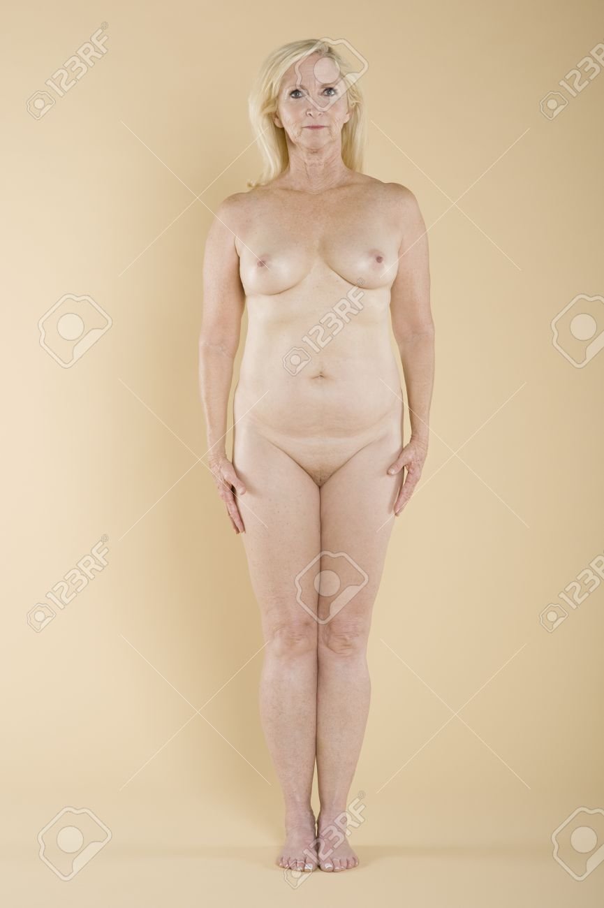 Stock Middle-Aged-Nude-Girl-Woman-to-Door-Bedroom