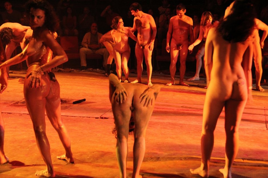 Naked actors on the stage of the theater