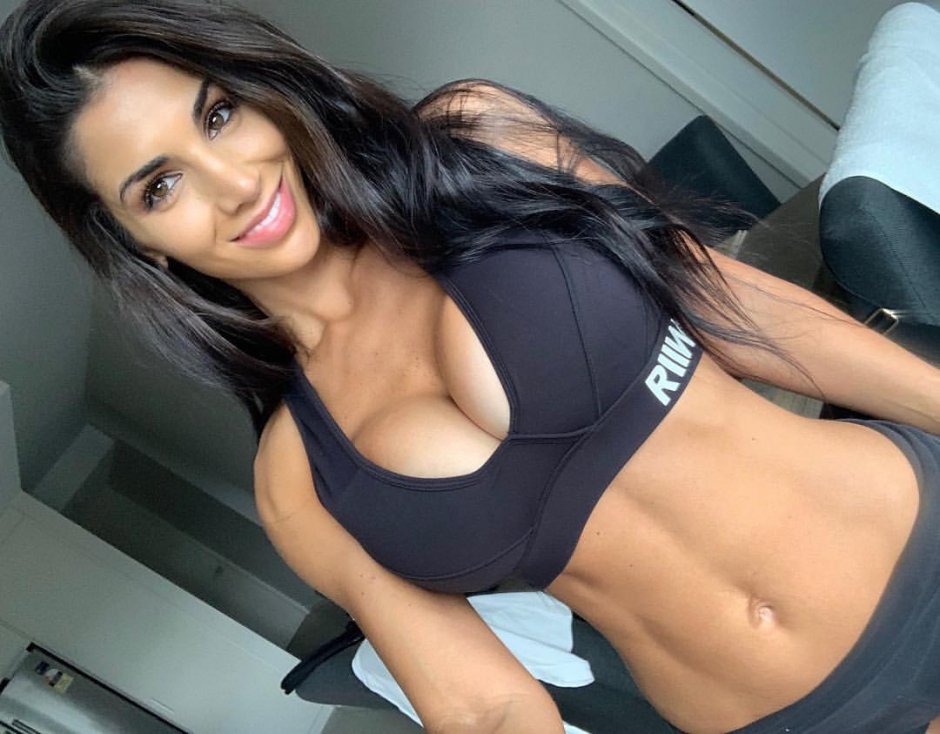 Tits through a sports bra