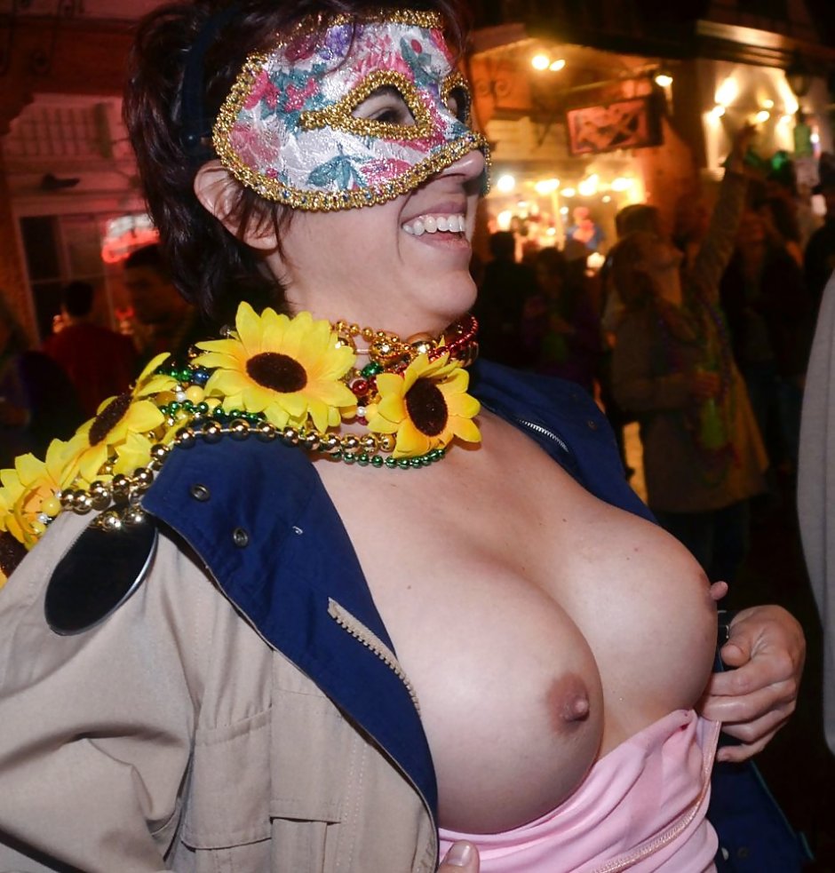 The girl showed her breasts on the parade