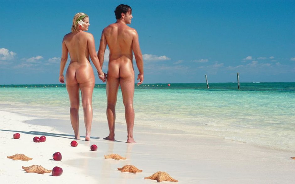 Naked men and women on the beach