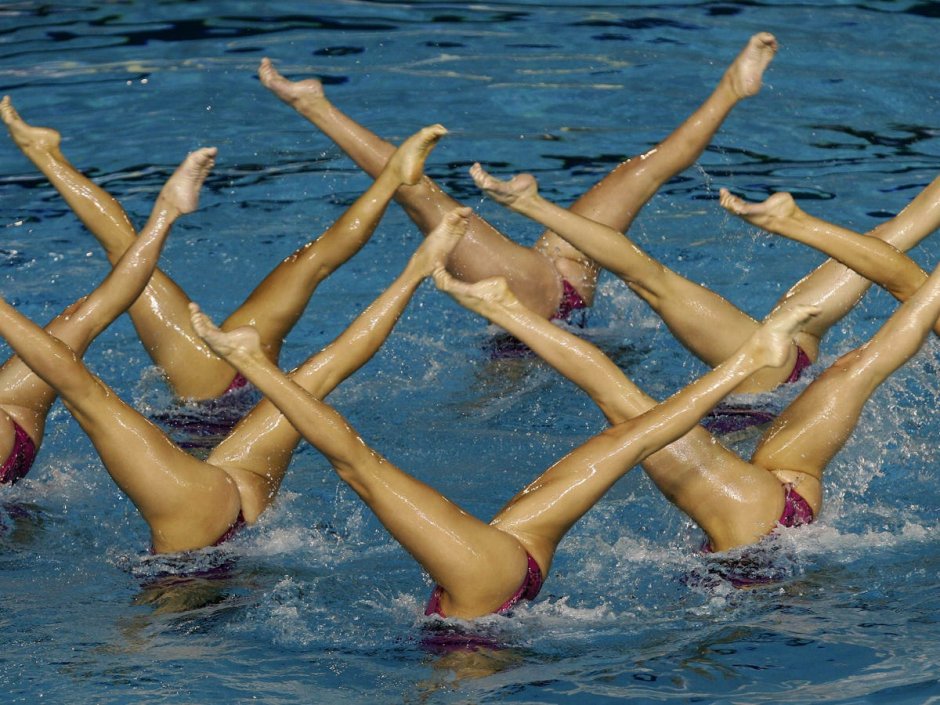 Naked swimmers synchronous swimming