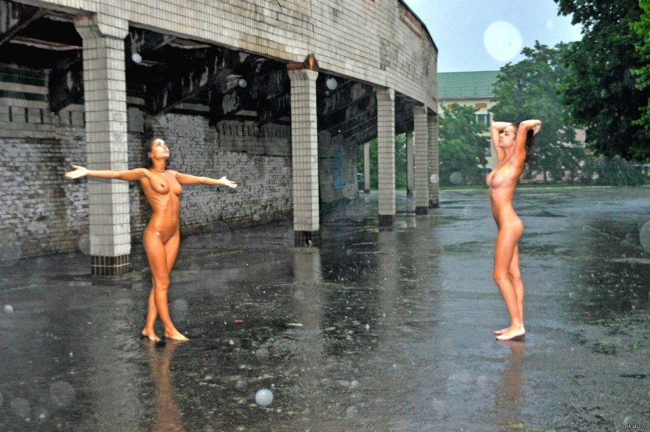 Girl naked in the rain