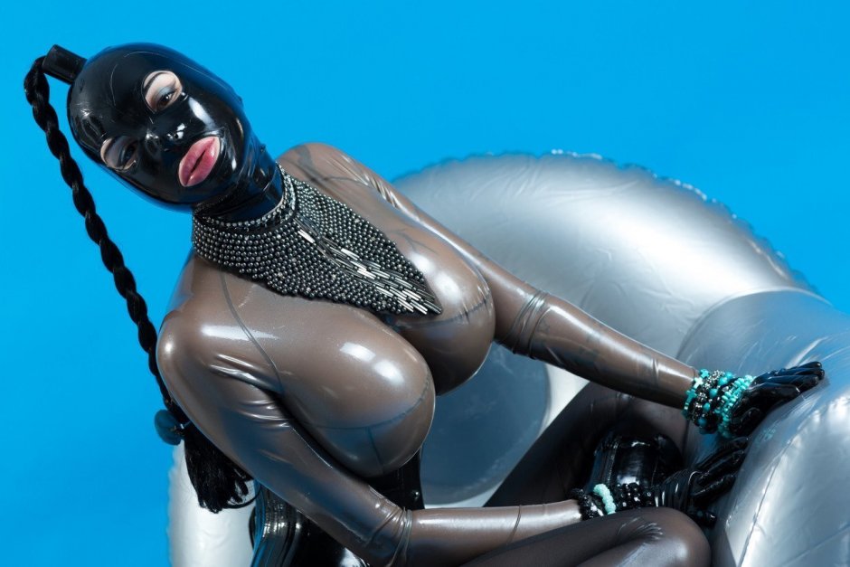 Girl in latex with huge tits