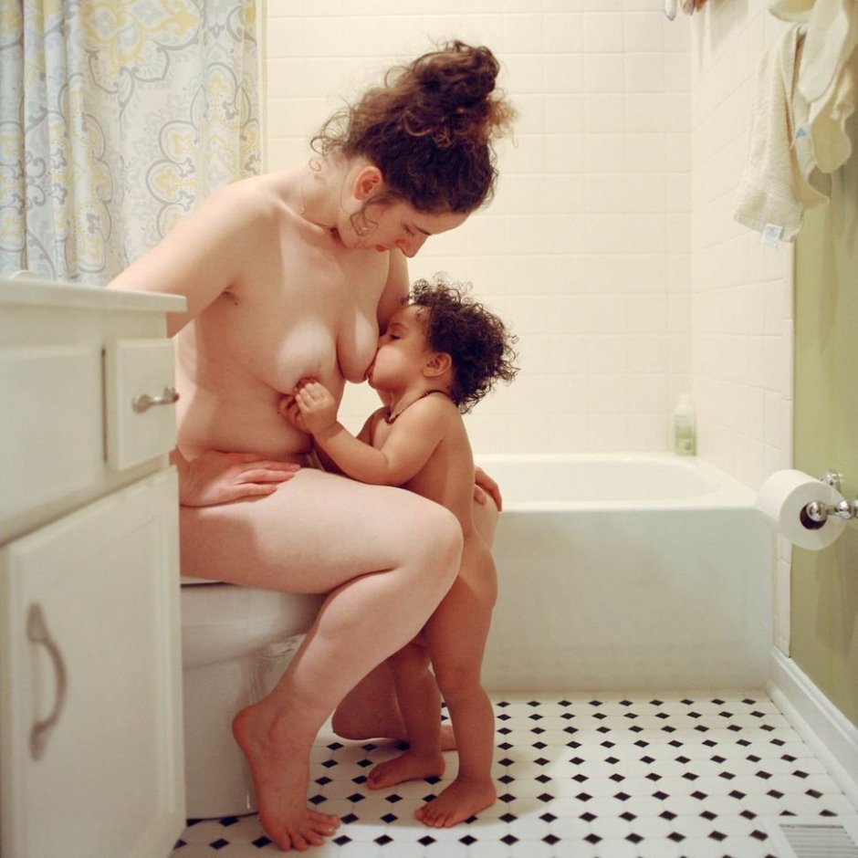 Naked woman with a baby