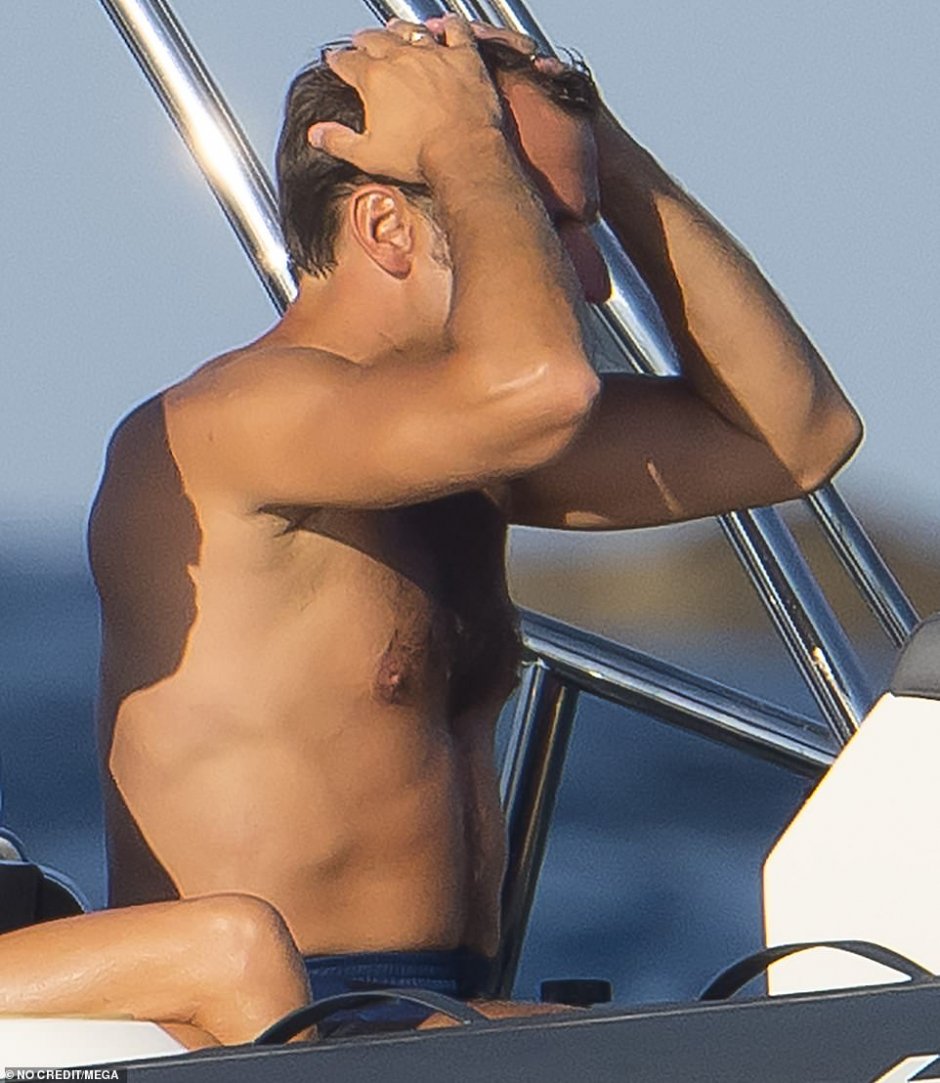Emmanuel Macron in swimming trunks