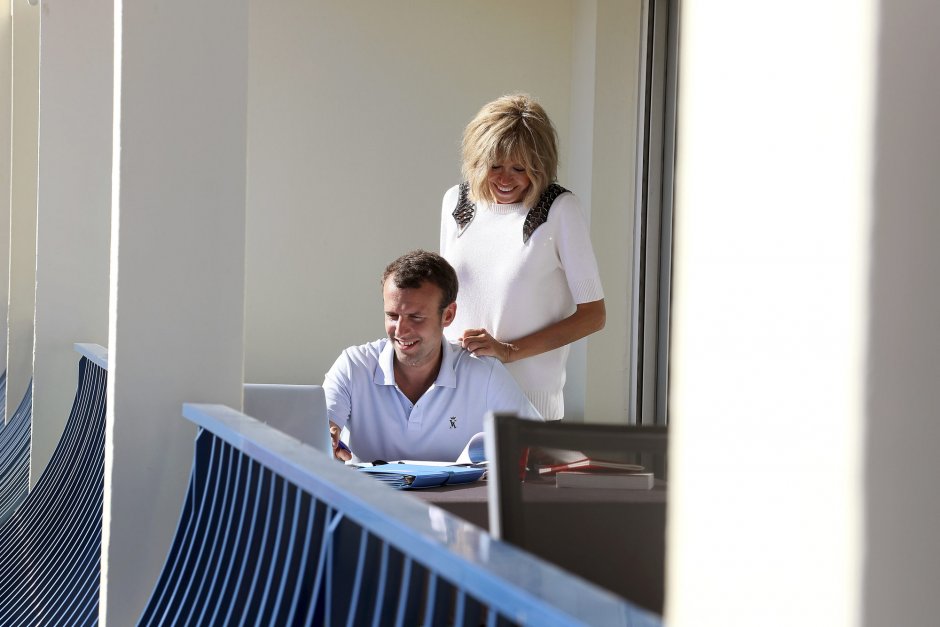 Emmanuel and Bridget Macron on the beach