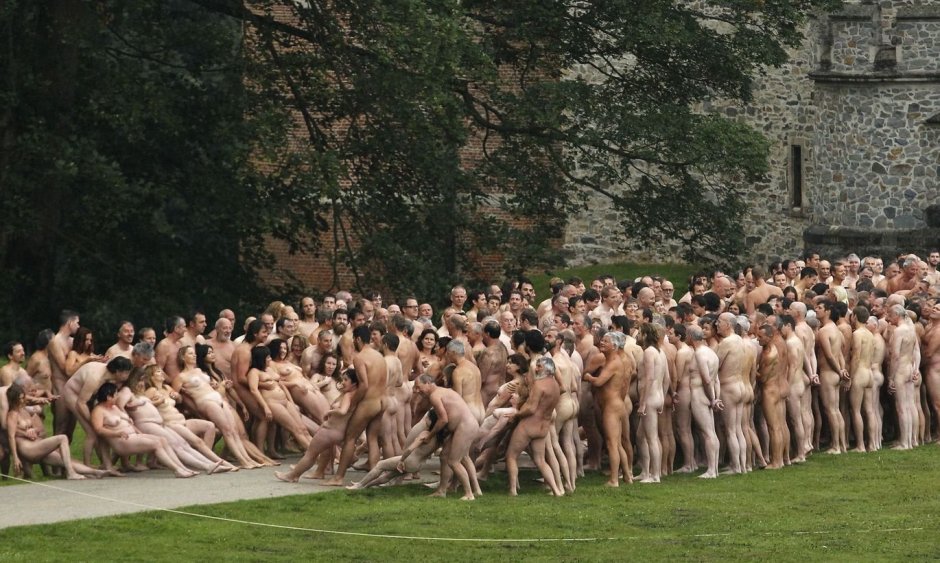 Naked girls among people