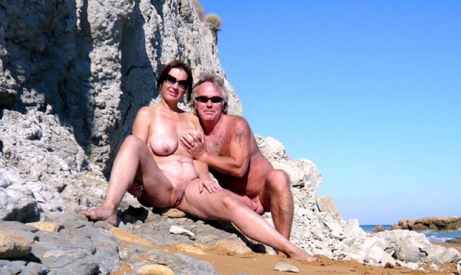 Mature pairs on a nudist beach